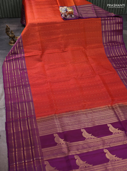Pure soft silk saree rustic orange and purple with allover zari weaves and zari woven border