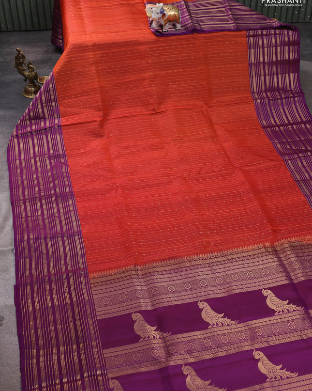 Pure soft silk saree rustic orange and purple with allover zari weaves and zari woven border