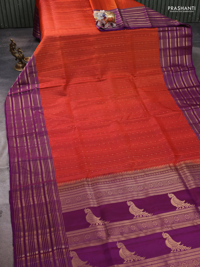 Pure soft silk saree rustic orange and purple with allover zari weaves and zari woven border