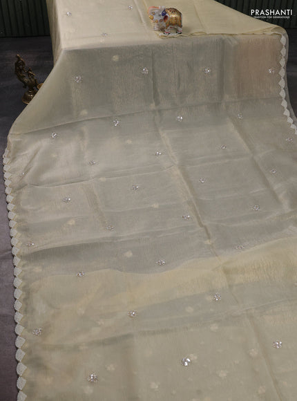 Crush tissue saree pale yellow with beaded work and beaded border