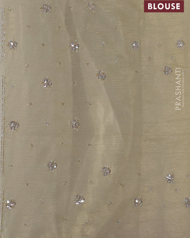 Crush tissue saree pale yellow with beaded work and beaded border