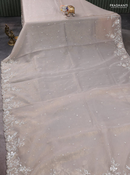 Crush tissue saree grey and wiith allover sequin work and embroidery border