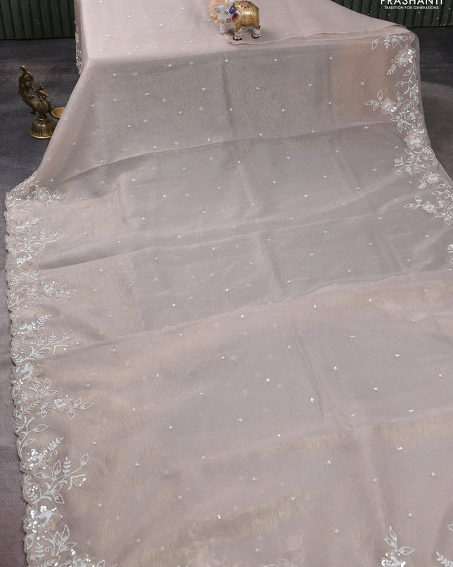 Crush tissue saree grey and wiith allover sequin work and embroidery border