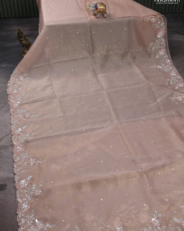 Crush tissue saree mild peach and wiith allover sequin work and embroidery border