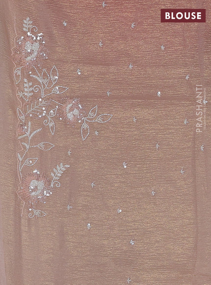 Crush tissue saree mild peach and wiith allover sequin work and embroidery border