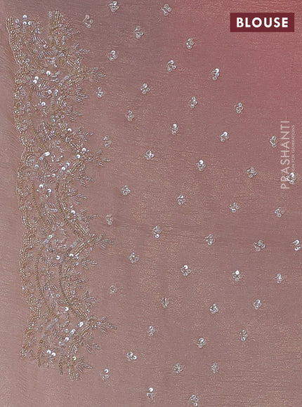 Crush tissue saree mild peach and wiith allover sequin work and embroidery border