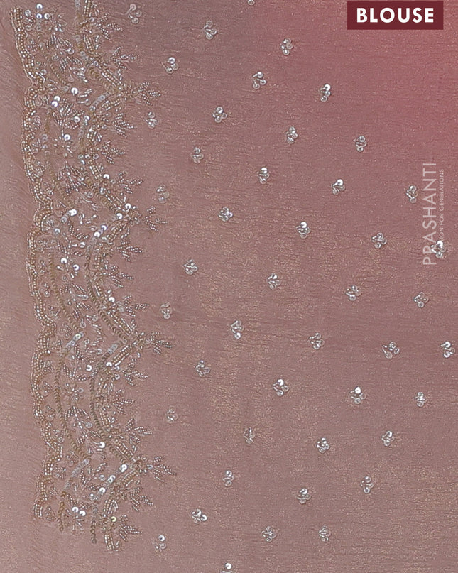 Crush tissue saree mild peach and wiith allover sequin work and embroidery border