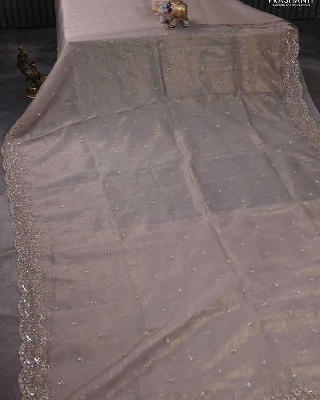 Crush tissue saree grey and wiith allover sequin work and embroidery border