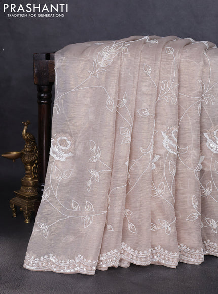 Crush tissue saree beige with allover beaded & sequin work and embroidery border