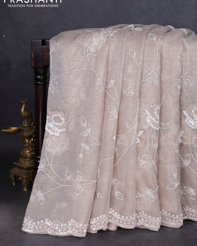 Crush tissue saree beige with allover beaded & sequin work and embroidery border