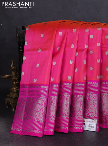 Venkatagiri silk saree dual shade of pinkish orange and pink with allover silver zari woven buttas and silver zari woven border