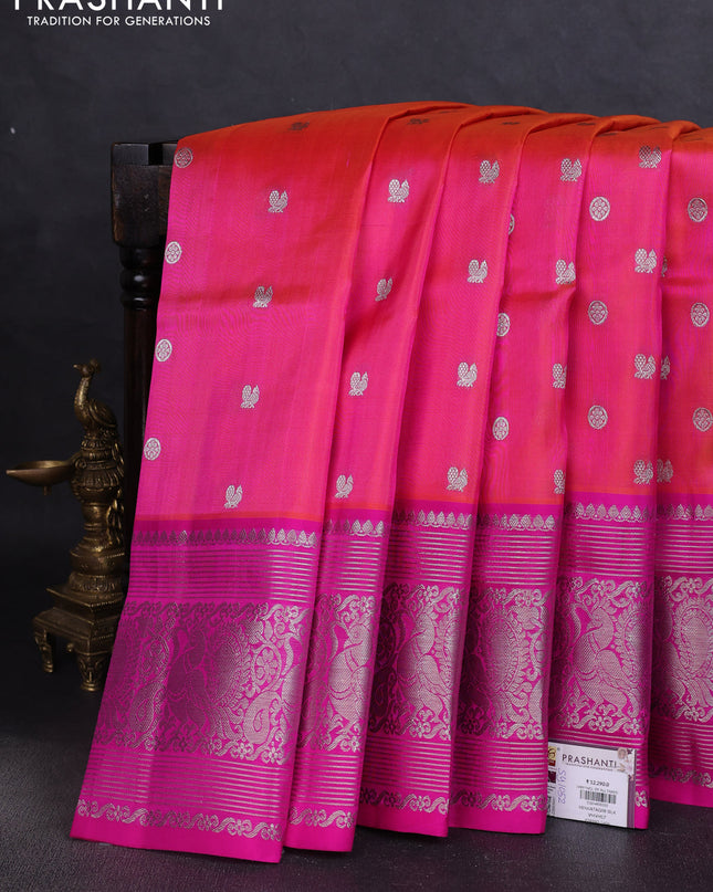 Venkatagiri silk saree dual shade of pinkish orange and pink with allover silver zari woven buttas and silver zari woven border