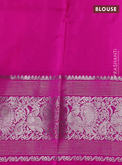 Venkatagiri silk saree dual shade of pinkish orange and pink with allover silver zari woven buttas and silver zari woven border