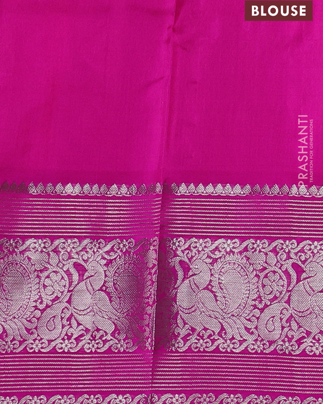 Venkatagiri silk saree dual shade of pinkish orange and pink with allover silver zari woven buttas and silver zari woven border