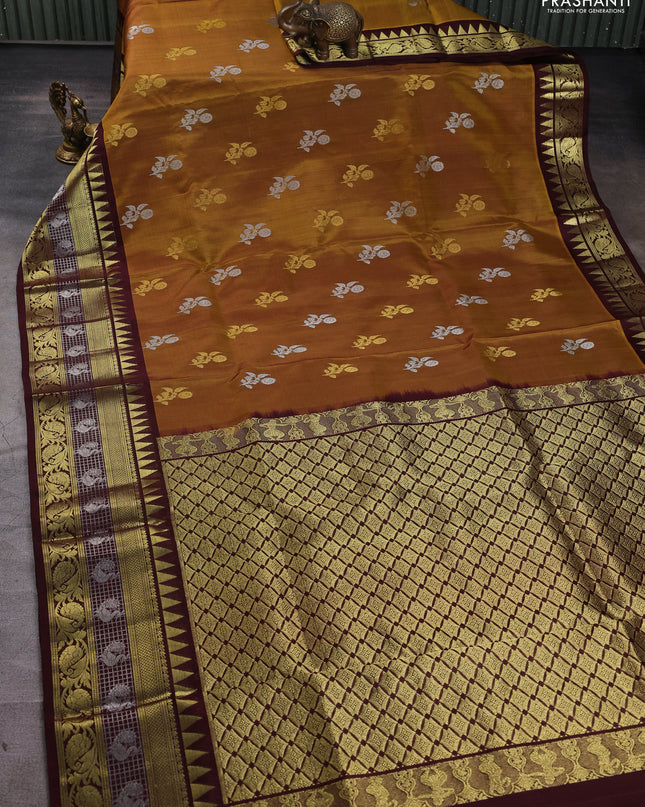 Venkatagiri silk saree dark mustard and deep maroon with silver & gold zari woven buttas and temple design zari woven border