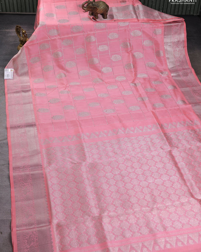 Venkatagiri silk saree peach shade with allover silver zari checks & buttas and silver zari woven border