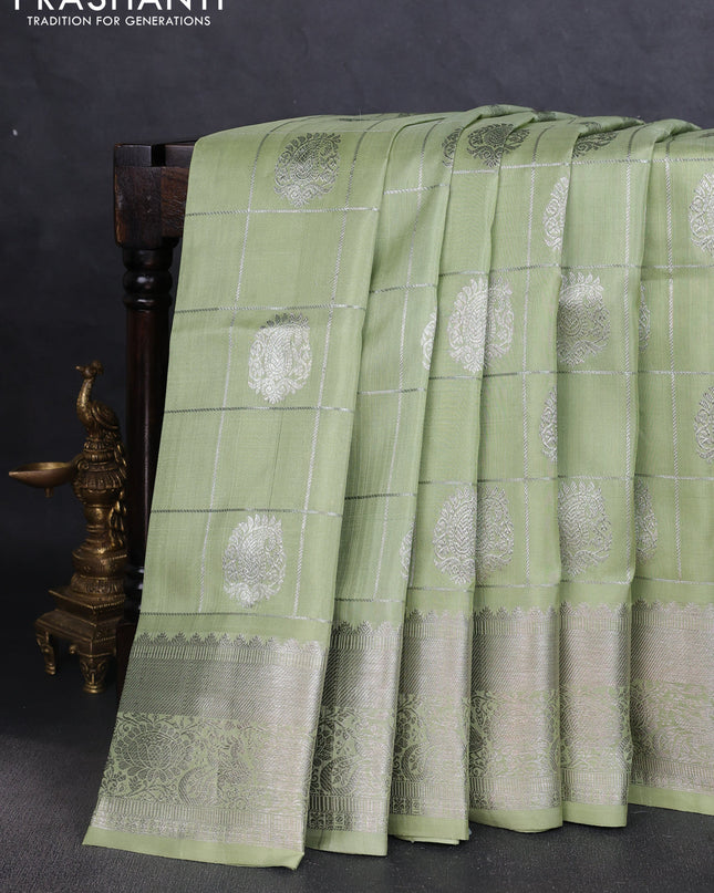 Venkatagiri silk saree pista green with allover silver zari checks & buttas and silver zari woven border