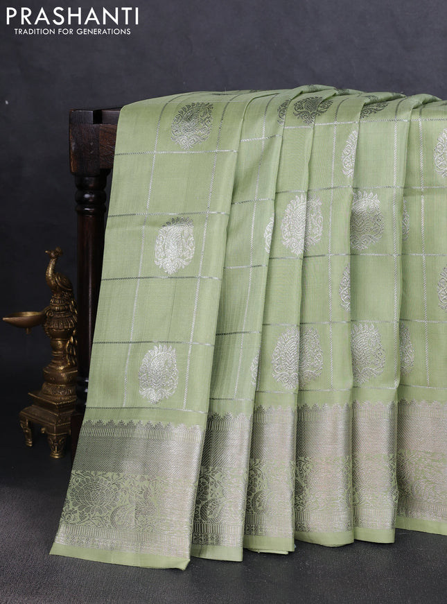 Venkatagiri silk saree pista green with allover silver zari checks & buttas and silver zari woven border