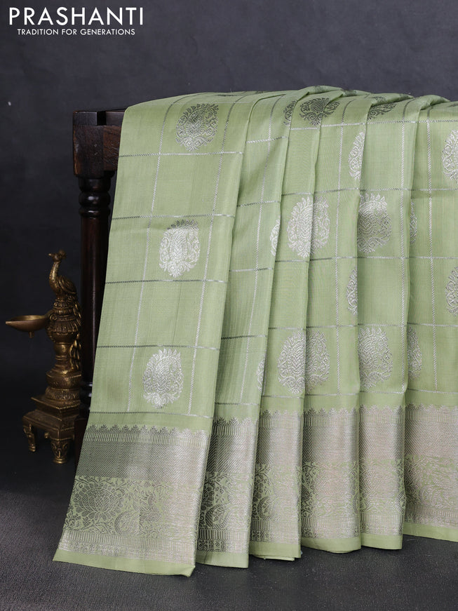 Venkatagiri silk saree pista green with allover silver zari checks & buttas and silver zari woven border
