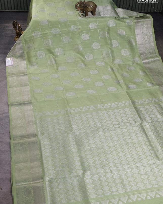 Venkatagiri silk saree pista green with allover silver zari checks & buttas and silver zari woven border