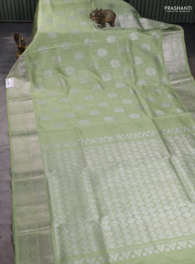Venkatagiri silk saree pista green with allover silver zari checks & buttas and silver zari woven border