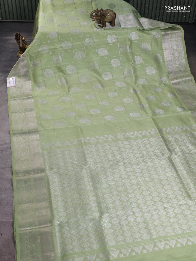 Venkatagiri silk saree pista green with allover silver zari checks & buttas and silver zari woven border
