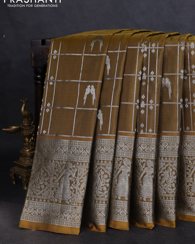 Venkatagiri silk saree mehendi green with allover silver zari checks & buttas and long silver zari woven border