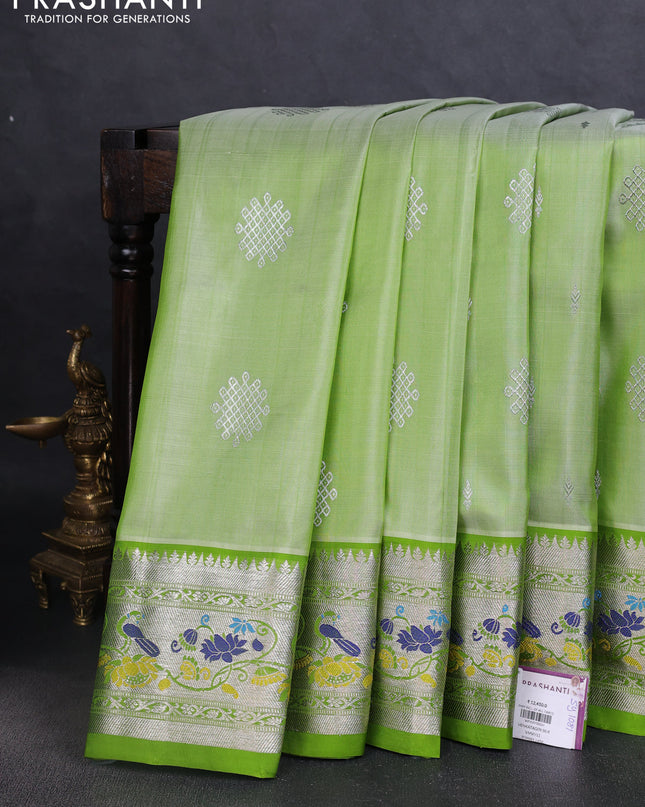 Venkatagiri silk saree light green with silver zari woven rangoli buttas and rich zari woven border