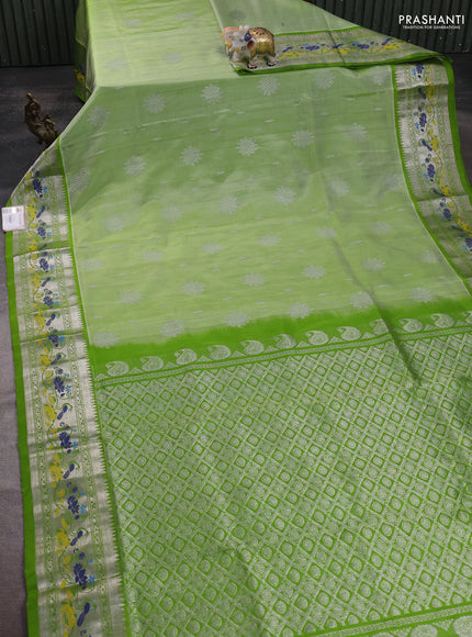 Venkatagiri silk saree light green with silver zari woven rangoli buttas and rich zari woven border