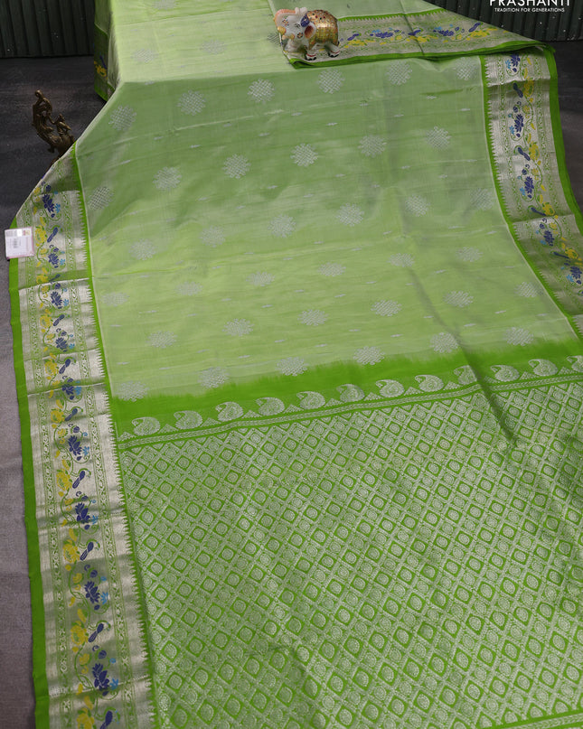 Venkatagiri silk saree light green with silver zari woven rangoli buttas and rich zari woven border