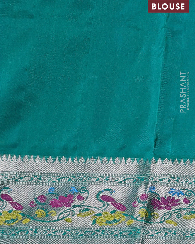 Venkatagiri silk saree dual shade of purple and green with silver zari woven rangoli buttas and rich zari woven border