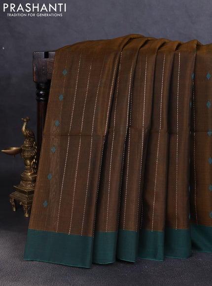 Kora silk cotton saree honey shade and peacock green with allover zari stripes pattern and simple border