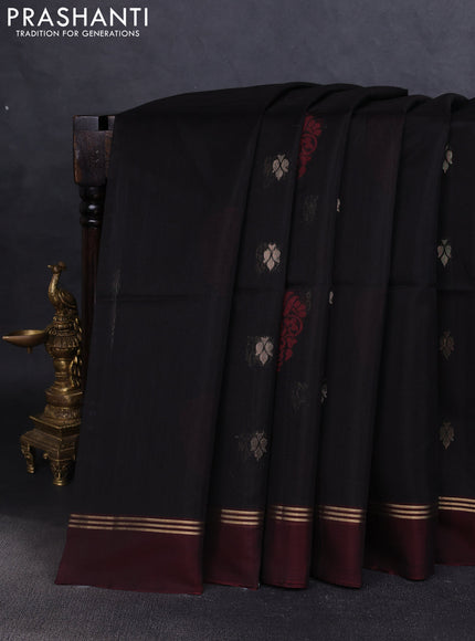 Kora silk cotton saree black and deep maroon with zari woven buttas and zari woven simple border