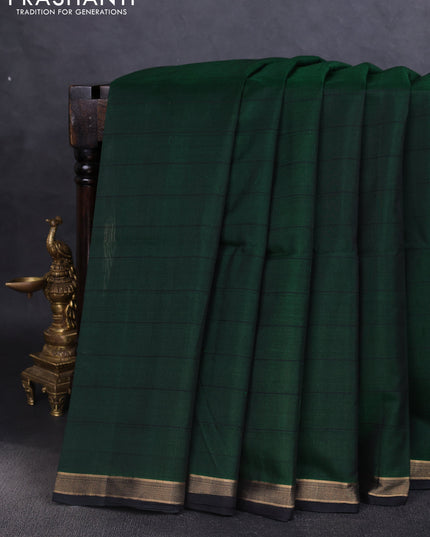Kora silk cotton saree green and black with allover checked pattern and ikat woven pallu