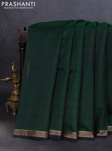 Kora silk cotton saree green and black with allover checked pattern and ikat woven pallu