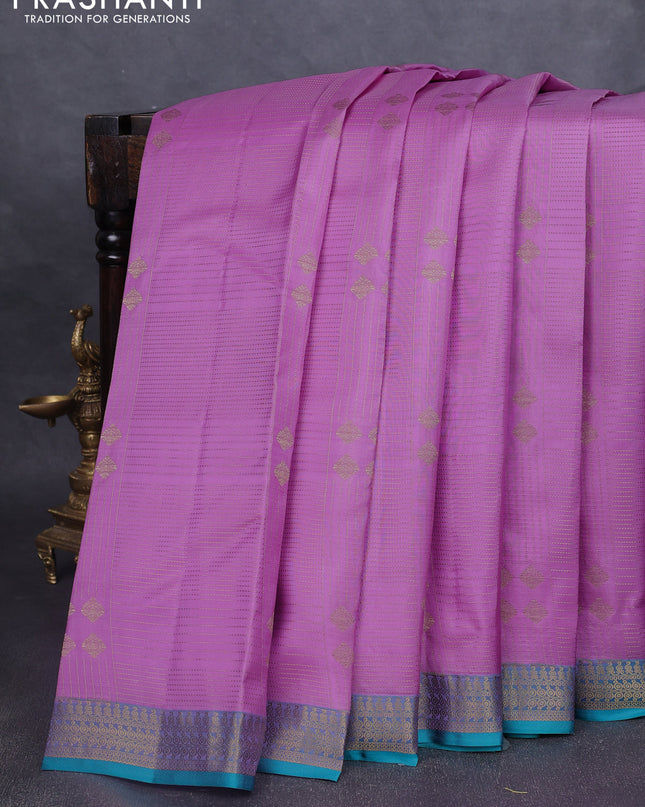 Pure kanchipuram silk saree lotus pink and teal green with allover zari weaves and rich zari woven border