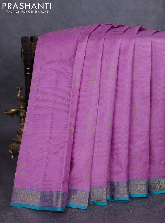 Pure kanchipuram silk saree lotus pink and teal green with allover zari weaves and rich zari woven border