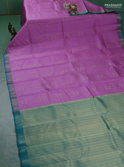 Pure kanchipuram silk saree lotus pink and teal green with allover zari weaves and rich zari woven border