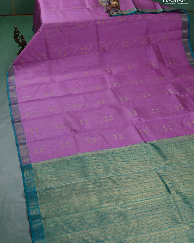 Pure kanchipuram silk saree lotus pink and teal green with allover zari weaves and rich zari woven border