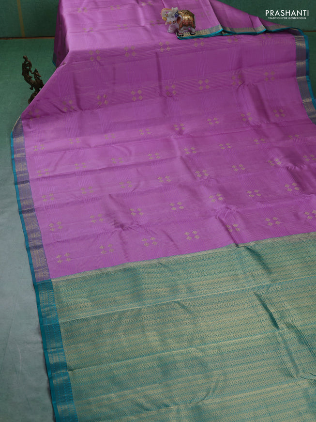 Pure kanchipuram silk saree lotus pink and teal green with allover zari weaves and rich zari woven border