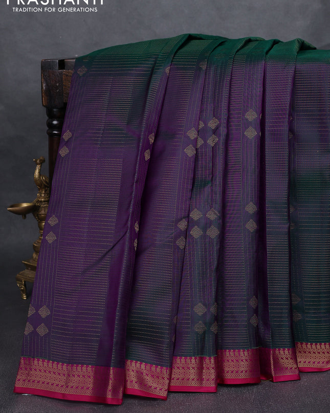 Pure kanchipuram silk saree dual shade of greenish purple and pink with allover zari weaves and rich zari woven border
