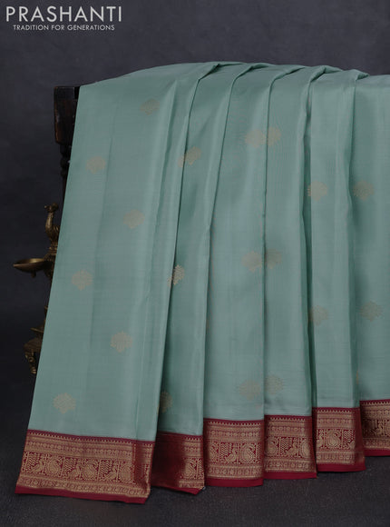 Pure kanchipuram silk saree pastel green and maroon with zari woven buttas and rich zari woven border
