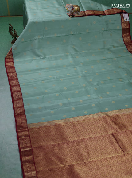 Pure kanchipuram silk saree pastel green and maroon with zari woven buttas and rich zari woven border