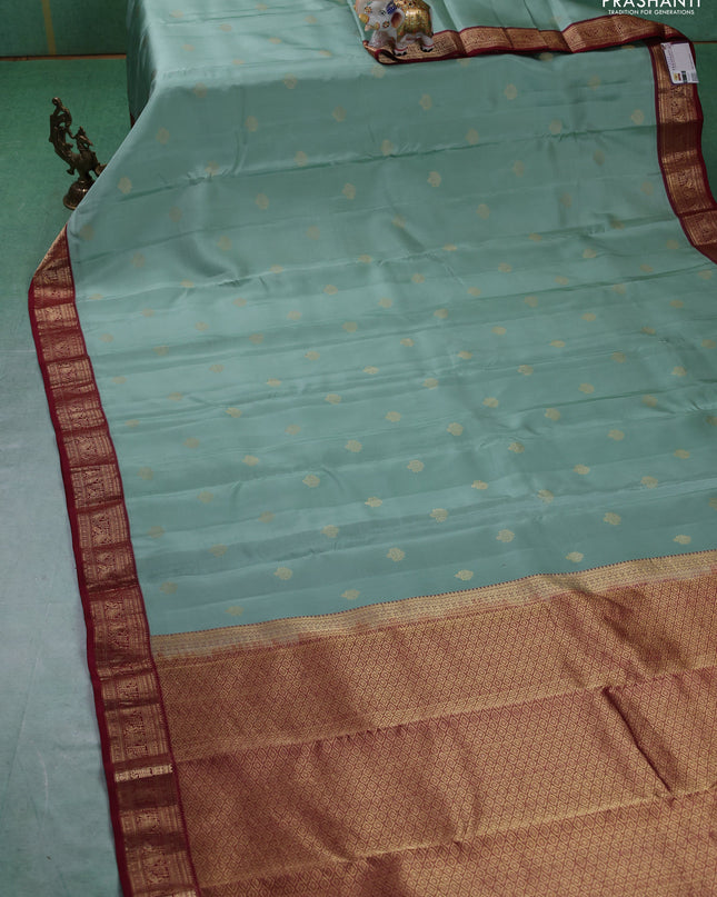 Pure kanchipuram silk saree pastel green and maroon with zari woven buttas and rich zari woven border