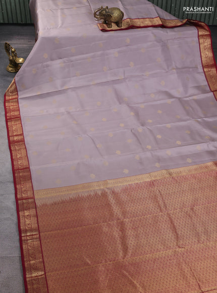 Pure kanchipuram silk saree pastel grey and maroon with zari woven buttas and rich zari woven border