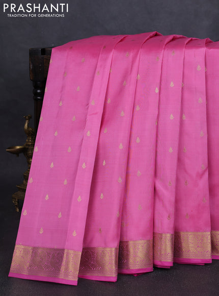 Pure kanchipuram silk saree light pink and pink with allover zari woven buttas and zari woven annam border