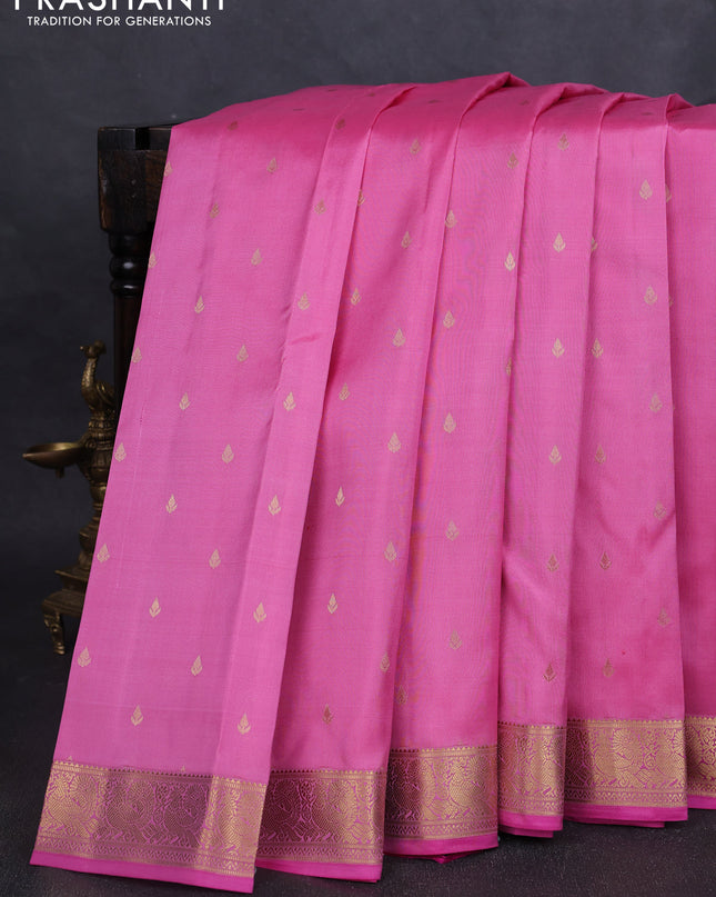 Pure kanchipuram silk saree light pink and pink with allover zari woven buttas and zari woven annam border