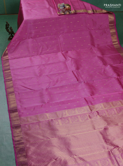 Pure kanchipuram silk saree light pink and pink with allover zari woven buttas and zari woven annam border
