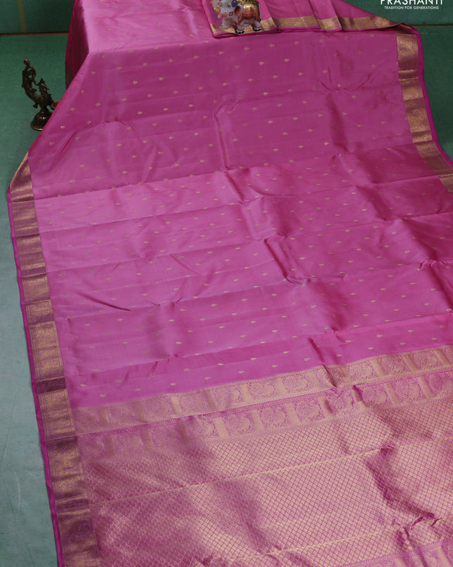 Pure kanchipuram silk saree light pink and pink with allover zari woven buttas and zari woven annam border