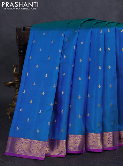 Pure kanchipuram silk saree dual tone blue and purple with allover zari woven buttas and zari woven annam border
